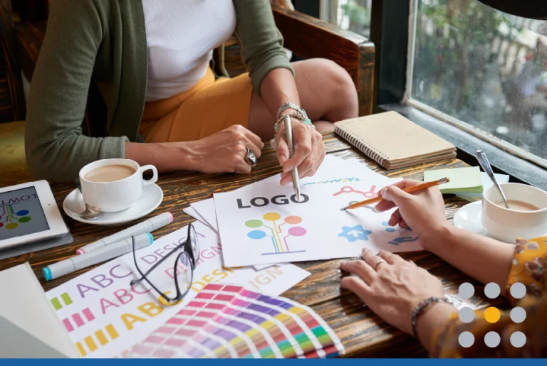 Two people working together to design an iconic logo