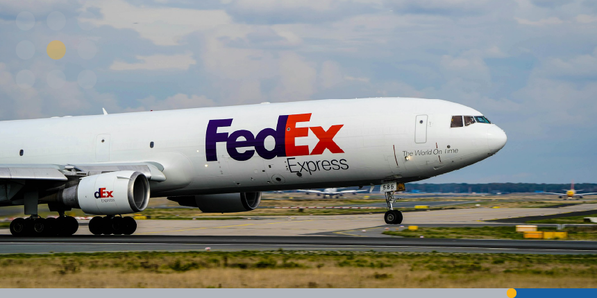 A large airplane with the FedEx logo on its right side.