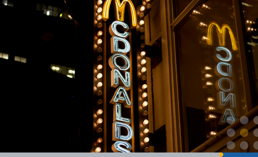 The famous McDonald’s logo lit up in neon