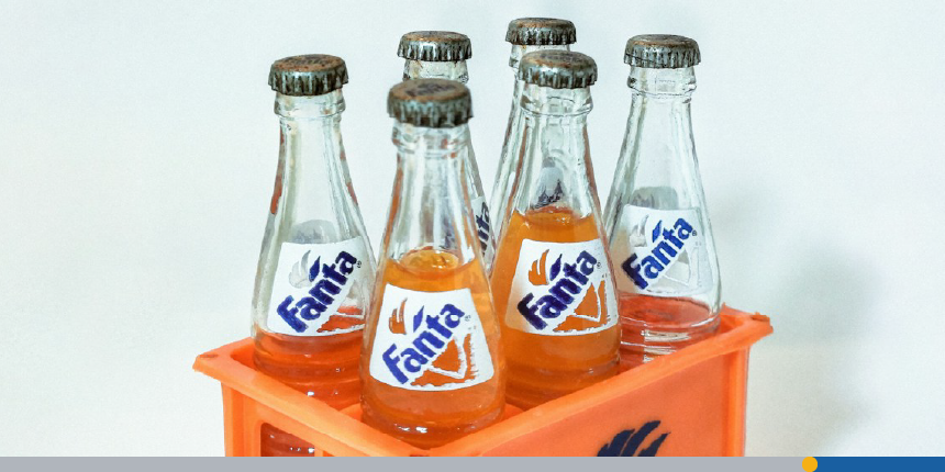 6 bottles of Fanta soda with Fanta's logo font displayed on each bottle.