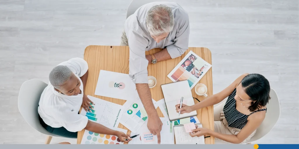 Team work, hands or creative business people in a meeting