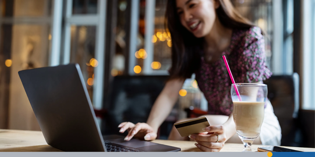 Young woman buying goods via internet