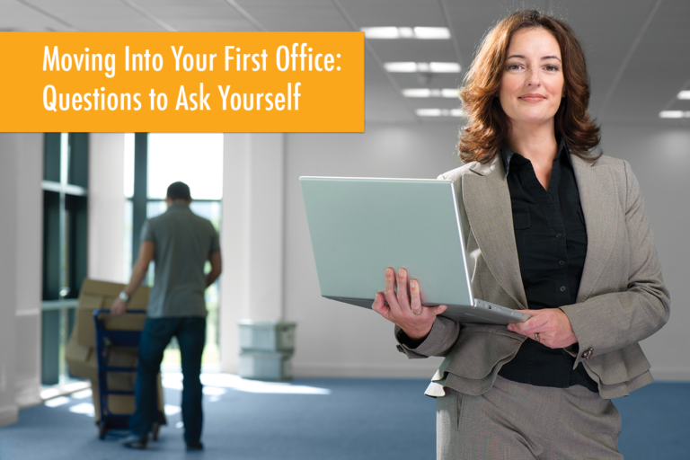 business woman holding laptop