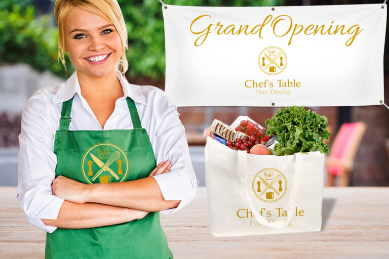 woman wearing branded apron with custom tote bag and banner